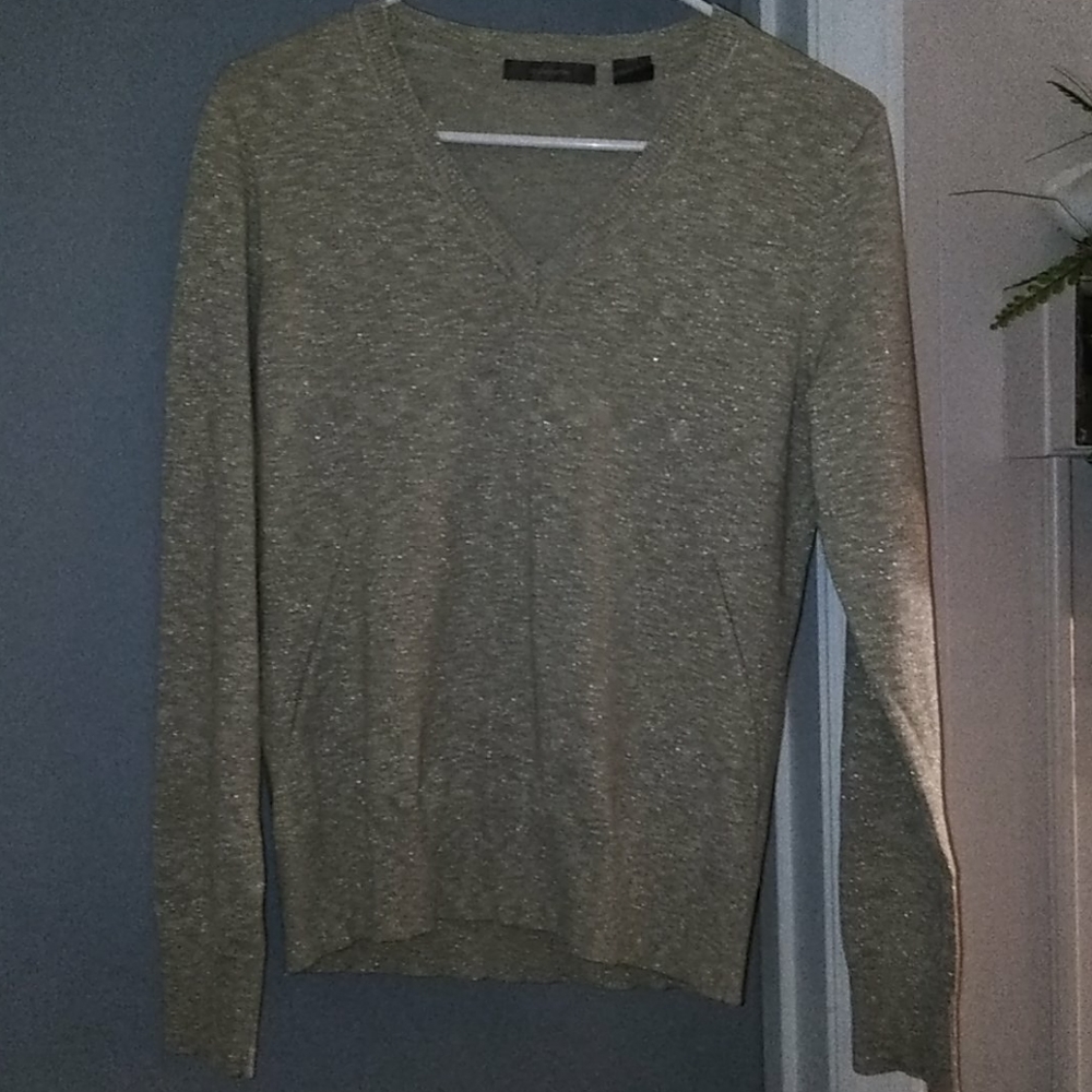 Dressy sweater. It's thin and comfortable